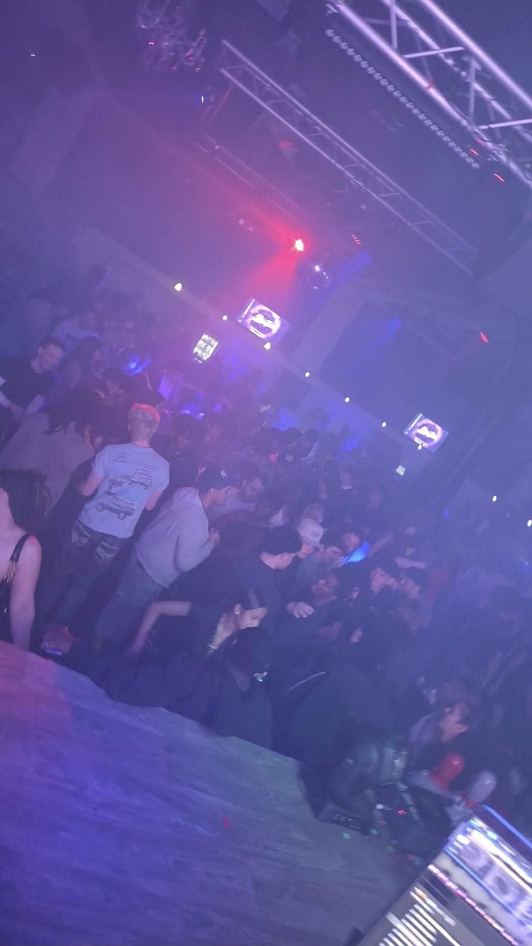 Live dance floor performance under stage lighting